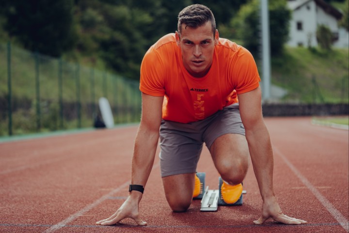 Athlete in the starting position on the track